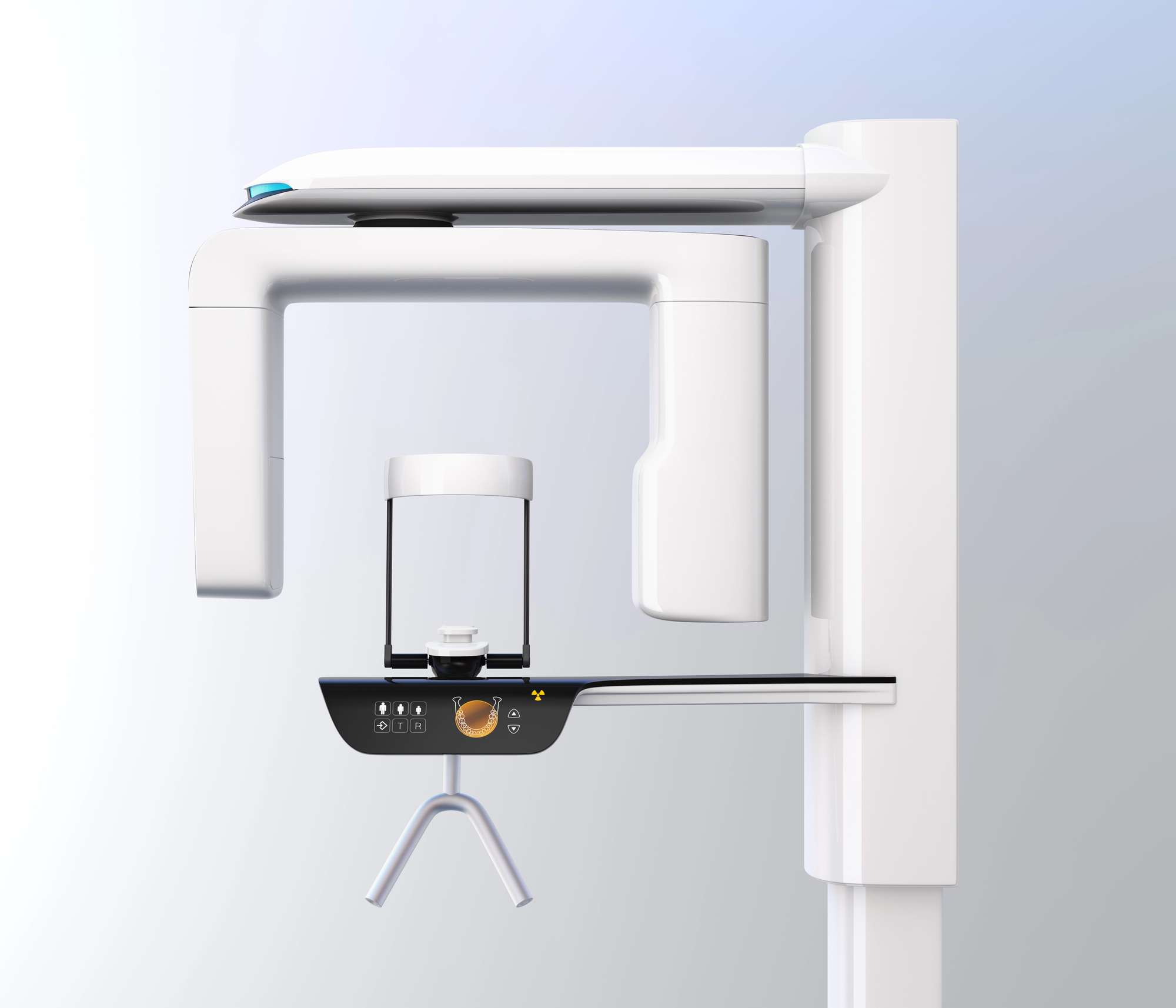 Modern panoramic dental X-ray machine with white and black components on a light background.